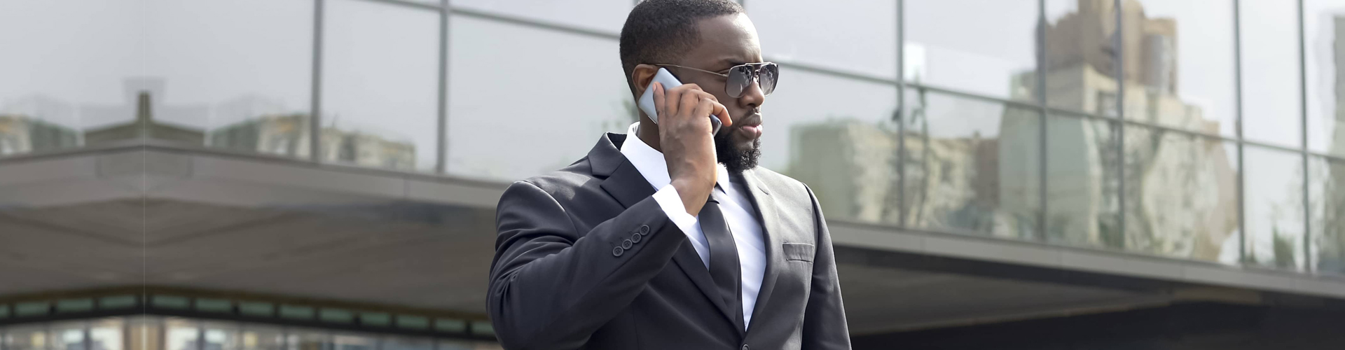 a man callling somebody on his phone